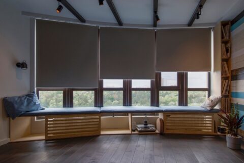 Roller blinds covering a large window in Tucson, AZ