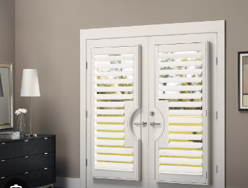 A white door featuring yellow blinds, showcasing NewStyle Hybrid Shutters in Tucson, AZ.