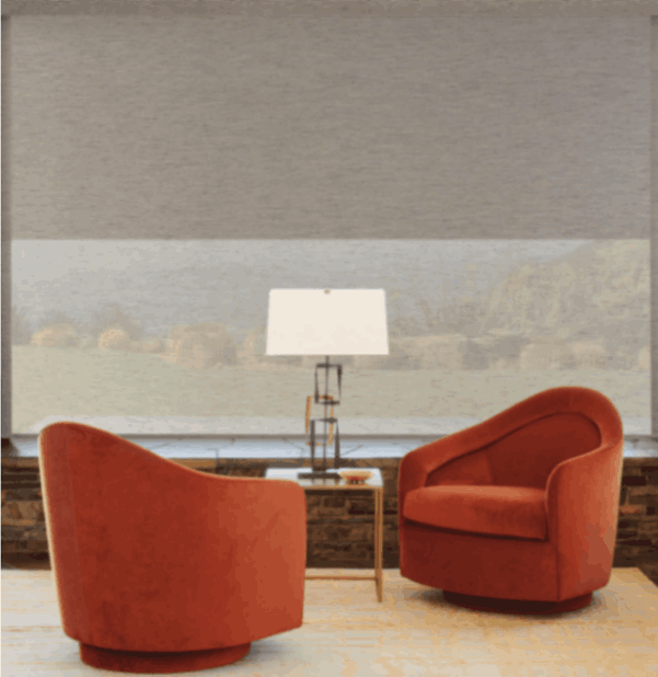 Living room with chairs and table featuring roller shades & blinds for light control in Tucson, AZ.